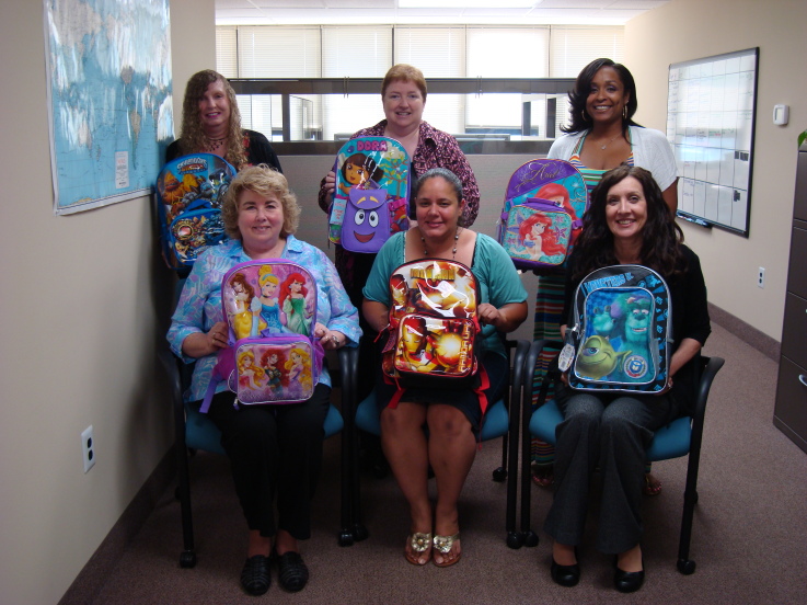 Talascend Mt. Laurel Team displaying their backpacks 